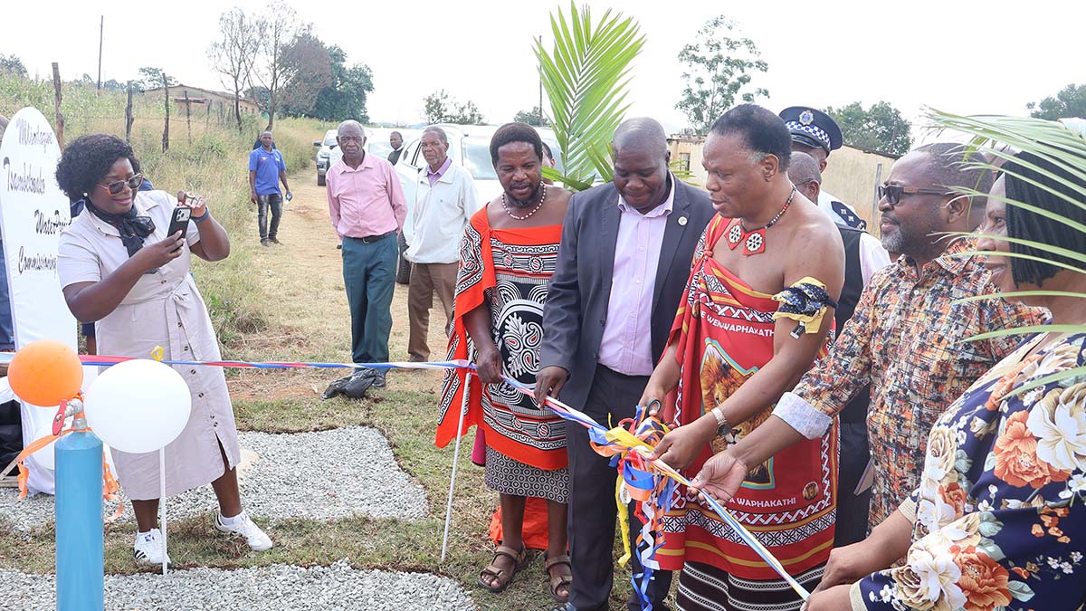 Minister for Natural Resources and Energy Prince Lonkhokhela cutting the ribbon opening the Mlindazwe-Tsembekwako Water Scheme under Gege Constituency yesterday. (Pics: Gcinile Phungwayo)